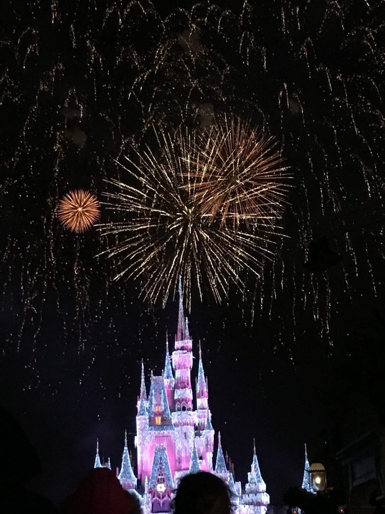 Disney castle with fireworks